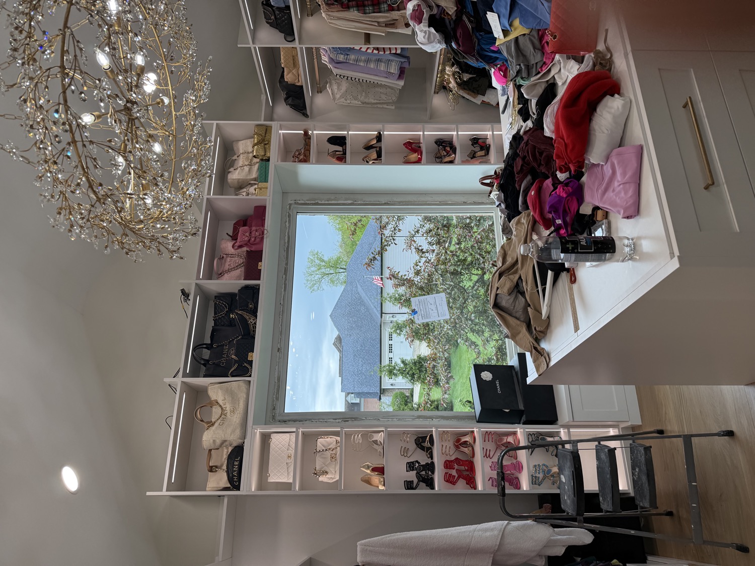 Finished custom walk-in closet with built-in shelving